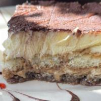 Tiramisu · Lady fingers dipped in liqueur laced espresso. Layered with sweet mascarpone, Myer's rum and...