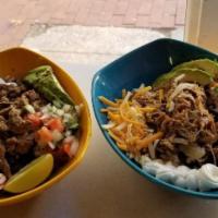 Burrito Bowl · Your Choice of Protein Chicken, Carnitas, Steak, Pastor, Ground Beef. Served With Lettuce, R...