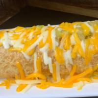 Smothered Burrito · Bacon or Pork Sausage + Eggs + Hash Browns+ Green or Red Chile.