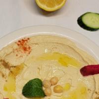 Hummus · Tasty Lebanese dip made from garbanzo beans, fresh lemon juice, garlic and sesame oil, with ...