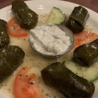 Meat Stuffed Grape Leaves · Stuffed with ground sirloin, rice & spices.
