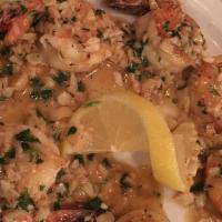 Shrimp Scampi Appetizer · Large shrimp sautéed with fresh garlic, butter, lemon juice and parsley.
