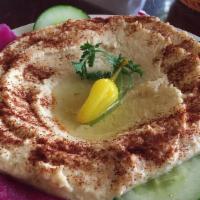 Hummus Ma-Lahm · The hummus dip topped with your choice of lamb, beef, chicken, gyro or our ground sirloin an...