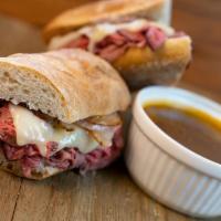 French Dip (Cb) · Made with 6 OZ Roast Beef, Swiss cheese, grilled onions & horseradish sauce.  Served on a fr...
