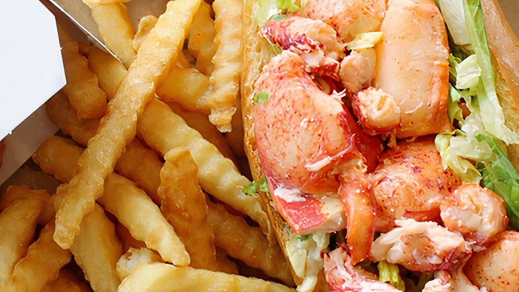 Large Lobster Roll & Fries · 1/2 Pound House Made Lobster - Served On A Grilled Torpedo Roll (on bed of lettuce) - Includes Fries & Cole Slaw