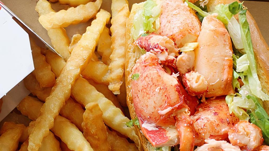 Small Lobster Roll & Fries · 1/4 Pound House Made Lobster - Served On A Grilled Torpedo Roll (on bed of lettuce) - Includes Fries & Cole Slaw