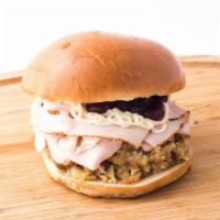 Thanksgiving · 1/4 Pound Of Our Oven Roasted Turkey, Stuffing, Cranberry & Mayo Served On A Sweet & Delicio...