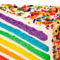 Vanilla Rainbow Cake Slice · Our best seller - six layers of rainbow-colored vanilla cake filled high with a sweet vanill...