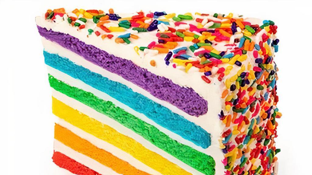 ** Vanilla Rainbow ** · Our best seller - six layers of rainbow-colored vanilla cake filled high with a sweet vanilla icing & covered with rainbow sprinkles