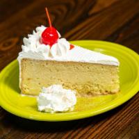 Pastel De Tres Leches · House-made! Sponge cake soaked in three kinds of milk with whipped cream icing.