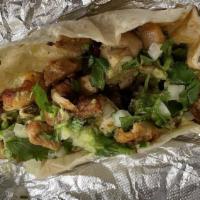 Burrito · Your choice of protein and toppings wrapped in a 12” flour tortilla.