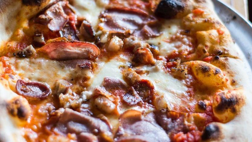 Intero Pizza · Sauce, mozzarella, three meats of our choice
typically Italian sausage, soppressata, and copa.