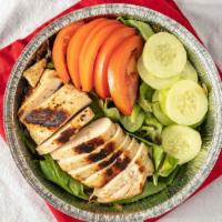 Grilled Chicken Over Salad · Chopped grilled chicken breast  over salad and sauce of your choice on the side.