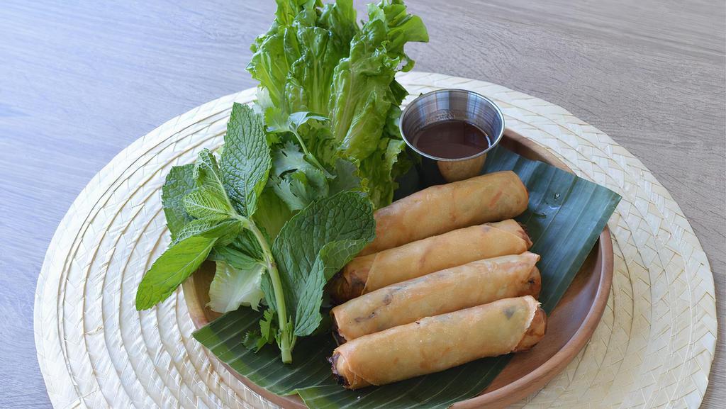 Cha' Gio' / Crispy Roll · Deep fried roll stuffed with pork, carrots, cabbages, glass noodle and served with plum sauce (4 pieces) (available in vegetarian).
