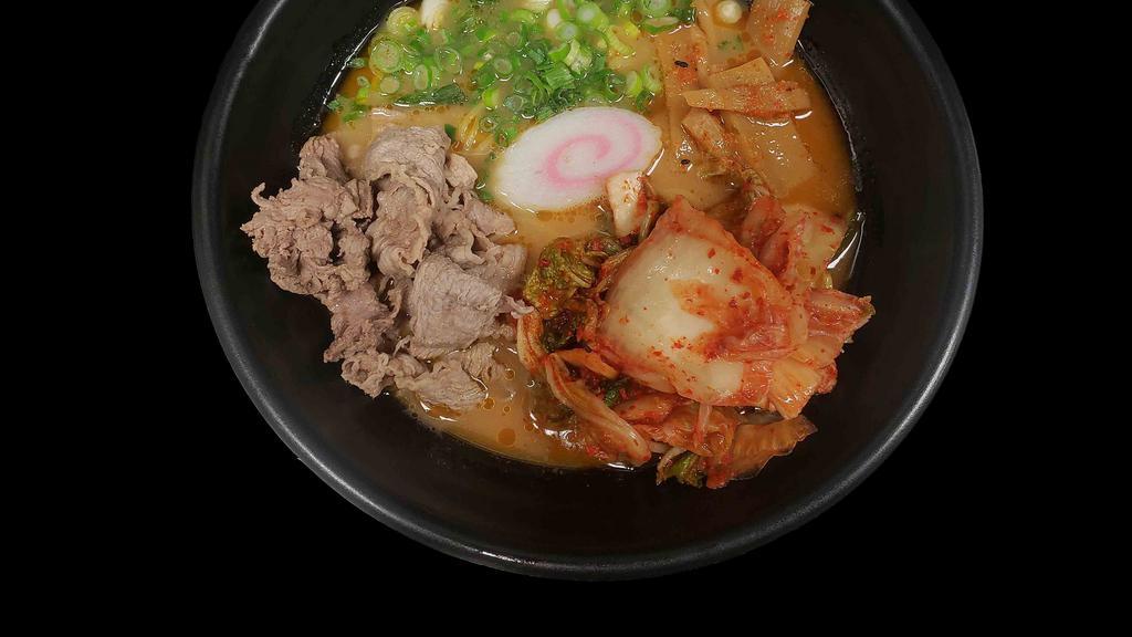 Kimchi Ramen · Sliced beef, fish cake, kimchi, bamboo shoot, green onion, nori, spicy oil and black garlic oil in spicy base.