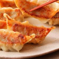 Fried/Steam Gyoza (6 Pc) · Pan fried or steamed dumpling filled with Pork and vegetable.
