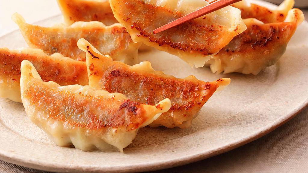 Fried/Steam Gyoza (6 Pc) · Pan fried or steamed dumpling filled with Pork and vegetable.