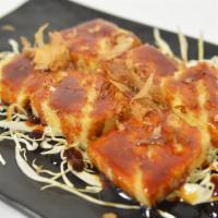 Age Tofu · Deep fried tofu with Japanese classical skewer sauce, topped with bonito flakes.