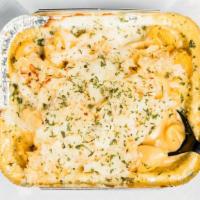 Krusty Mac · House mac and cheese. American and white cheddar. Mozzarella and Parm cheese - crumbled pota...