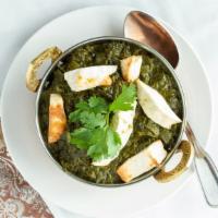 Saag Paneer · Chopped spinach and cubes of homemade cheese cooked with mild spices.
