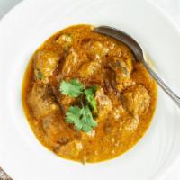 Lamb Korma · Cubes of lamb cooked in a special creamy sauce of yogurt and spices.