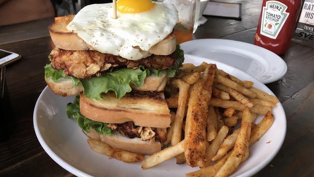 Potato Chip Crusted Chicken Sandwich · Potato chip crusted chicken breast, garlic aioli, lettuce, tomato, bacon, avocado, topped with sunny side up egg, toasted sourdough.