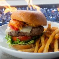 Volt Burger · Hand packed half pound patty, cheddar cheese, lettuce, caramelized onions, tomato, garlic ai...