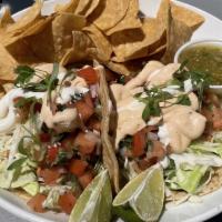 Fish Tacos (2) · Gluten-free. Fried or grilled fish tacos, chipotle aioli, cabbage slaw, salsa fresca, lime c...