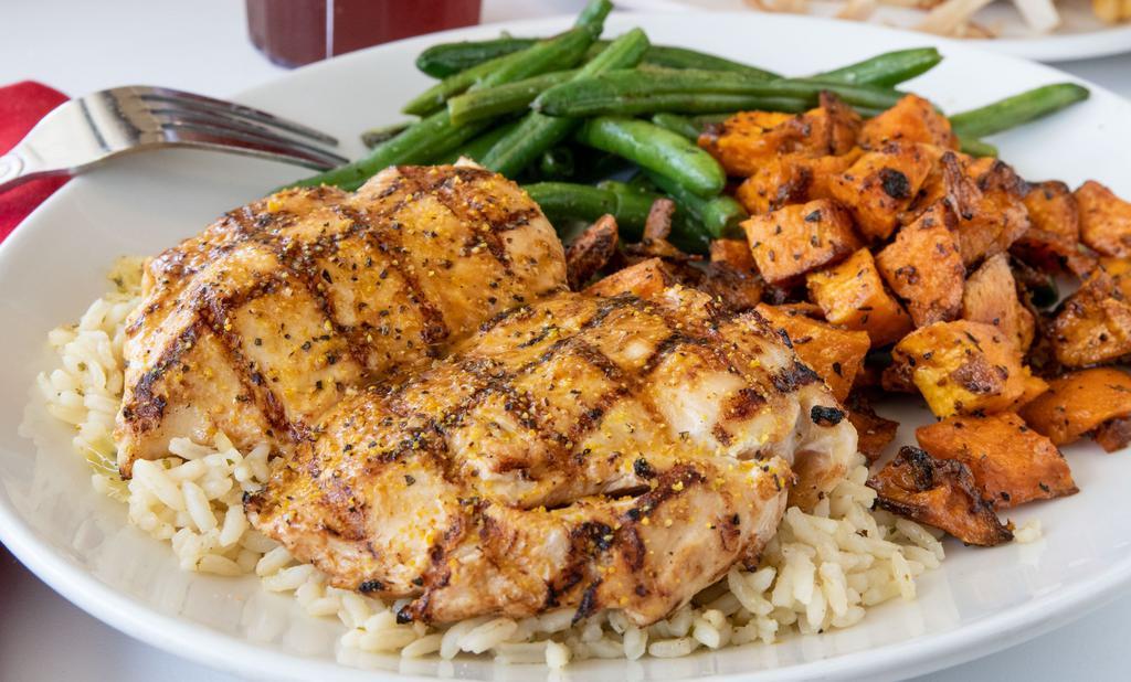 Grilled Chicken · In our house marinade, served with your choice of two sides.