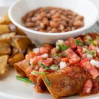 Vegan Enchiladas · Vegan, vegetarian. Two enchiladas with poblano peppers, mushrooms, and spinach in corn torti...