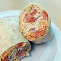 Chicken Salad Wrap · Chicken salad, lettuce, tomato, onions, and cheddar cheese on tortilla wrap.