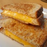 Trio Grilled Cheese W/Bacon · Melted american cheese, provolone cheese, Swiss cheese