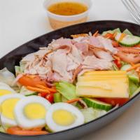 Chef'S Salad · Turkey, ham, provolone cheese, American cheese, lettuce, tomatoes, cucumber, red onion, gree...