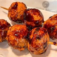 A13 Takoyaki Skewers(2) · Fried octopus balls/bbq sauce