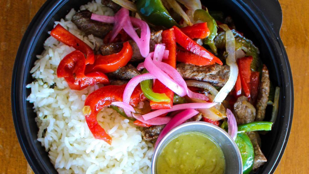 Fajita Bowl · Choice of fajita chicken or beef with grilled onions & bell peppers
