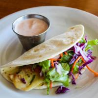 Fish Tacos · Tilapia, lettuce, cabbage & carrots served with a side of a house made chipotle ranch.