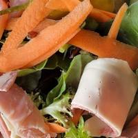 Chef Salad · Large Italian salad topped with provolone, ham, and salami.