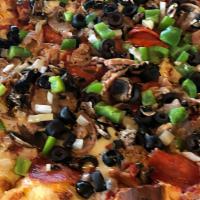 Supreme Pizza · Mozzarella, pepperoni, Italian sausage, mushrooms, onions, green peppers, and black olives.