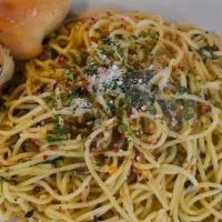 Spaghetti Aglio E Olio · Spaghetti sautéed in olive oil, garlic, fresh herbs, crushed red pepper, and sprinkled with ...
