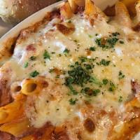 Baked Ziti · Penne pasta blended with marinara and seasoned ricotta, then baked with mozzarella.
