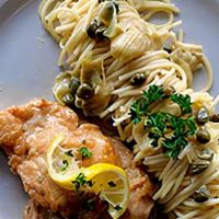 Chicken Piccata · Chicken medallions sautéed with artichoke hearts and capers in a white wine and lemon-butter...