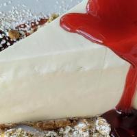 Ny Cheesecake · Cream cheese base, vanilla, mascarpone cream,
with a gram cracker crust
