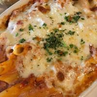 Gf-Baked Ziti · Gluten Free penne pasta blended with marinara and seasoned ricotta, then baked with mozzarel...