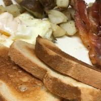 Traditional Breakfast · Two eggs any way with your choice of bacon,
sausage, or ham. Served with roasted potatoes.
C...