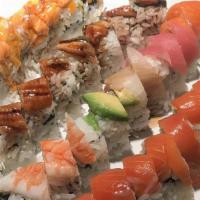 Sunset Roll · Shrimp tempura, crabmeat, avocado, cucumber roll topped fresh salmon avocado with mango sauce.