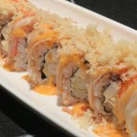 Wataga Roll · Shrimp tempura, cream cheese, avocado roll over crab stick spicy mayo, wasabi, eel sauce, an...