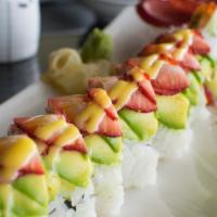 Valentine Roll · Shrimp tempura, spicy tuna, cucumber roll topped avocado, strawberry, mango and eel sauce.