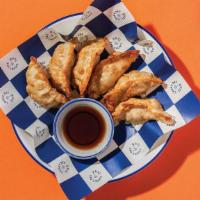 A5 Pot Stickers · Chicken and vegetable stuffed in wonton wrapper and deep fried, served with special black so...