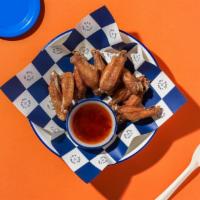 A1 Chicken Wings · Crispy chicken wings, marinated and deep fried, served with sweet chili sauce.