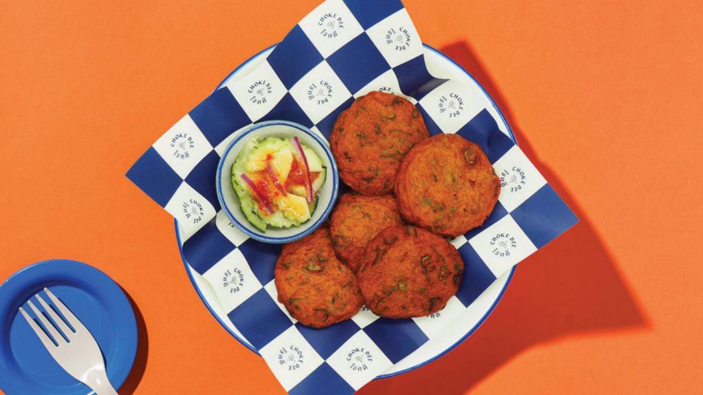 A7 Fried Fish Cakes · Deep-fried fish cake served with cucumber and sweet chili sauce.